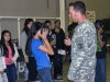 Anna Chen, an honor roll student with Clarksville’s West Creek Middle School, dons a chemical, biological, radiological and nuclear protective mask during a hands-on training taught by Sgt. 1st Class Glenn Riddell, an operations sergeant with the 218th Military Police Company, 716th Military Police Battalion, 101st Sustainment Brigade, 101st Airborne Division, during a visit to Fort Campbell, Ky., from the WCMS honor roll students May 15, 2015. (Sgt. 1st Class Mary Rose Mittlesteadt, 101st Sustainment Brigade, 101st Airborne Division (Air Assault) Public Affairs)