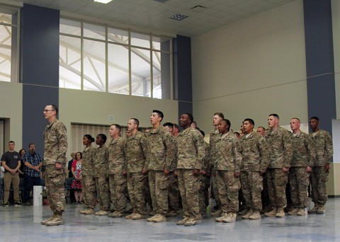 Soldiers with the 551st Military Police Company "Hooligans," 716th Military Police Battalion, 101st Sustainment Brigade "Lifeliners," 101st Airborne Division (Air Assault), stand at attention during a welcome home ceremony April 10, at Fort Campbell. (U.S. Army photo by Sgt. Sinthia Rosario, 101st Sustainment Brigade Public Affairs) Soldiers with the 551st Military Police Company "Hooligans," 716th Military Police Battalion, 101st Sustainment Brigade "Lifeliners," 101st Airborne Division (Air Assault), stand at attention during a welcome home ceremony April 10, at Fort Campbell. (U.S. Army photo by Sgt. Sinthia Rosario, 101st Sustainment Brigade Public Affairs)