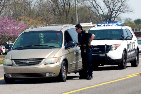 A Clarksville Police Officer with someone pulled over for Distracted Driving. (Doug Burgess)