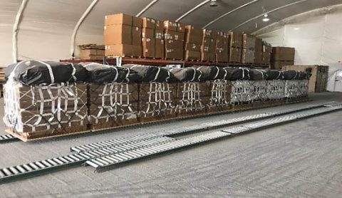 Soldiers of the 824th Quartermaster Company and the 101st Resolute Support Sustainment Brigade rigged several bundles of food and water at the Bagram, Afghanistan rigger shed. The rigged supplies will be loaded on to an aircraft and delivered to the requesting unit. (1st Lt. Verniccia Ford, 101st Airborne Division (AA) Sustainment Brigade Public Affairs) Soldiers of the 824th Quartermaster Company and the 101st Resolute Support Sustainment Brigade rigged several bundles of food and water at the Bagram, Afghanistan rigger shed. The rigged supplies will be loaded on to an aircraft and delivered to the requesting unit. (1st Lt. Verniccia Ford, 101st Airborne Division (AA) Sustainment Brigade Public Affairs)