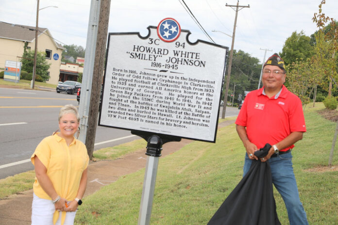 Erin Hedrick and Van Canuto unveil a Tennessee Historical Marker honoring Howard Smiley Johnson. (Tony Centonze, Clarksville Living Magazine)