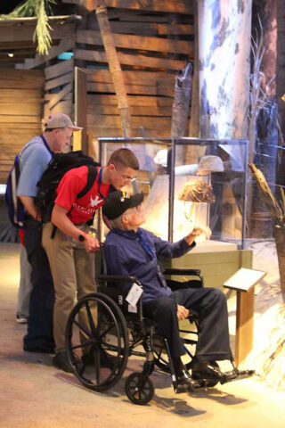 Colonel Joe Peterburs and Rossview High School Students at the National World War II Museum