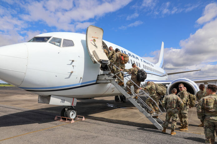 Soldiers with the Tennessee National Guard's 278th Armored Calvary Regiment's Task Force Two depart Volunteer Training Site-Smyrna enroute to Fort Cavasos, Texas, May 30, for additional training before flying to Kuwait for a nearly year-long deployment. (Spc. Landon Evans)