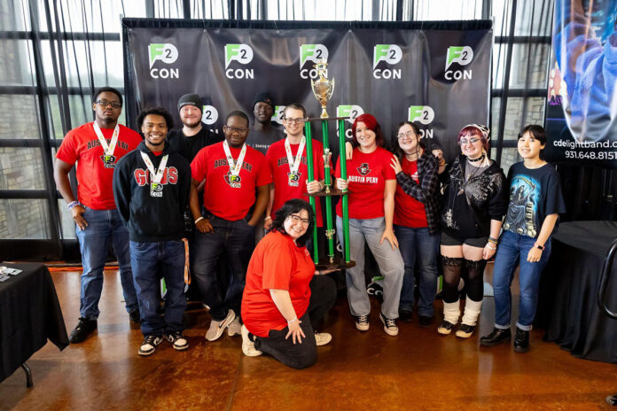 Govs Gaming receives a trophy after defeating Middle Tennessee State University in a Tekken 8 competition at CDE Lightband’s F2CON. (Sean McCully, APSU)