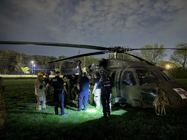 Tennessee Army National Guard flight crew and rescue personnel transfer an injured hiker suffering severe lower extremity injuries, following a rockslide near Signal Mountain, from a Tennessee Army National Guard UH-60 Blackhawk to an awaiting ambulance at Chattanooga’s Lincoln Park, next to Erlanger Baroness Hospital, March 21st. (submitted photo) 