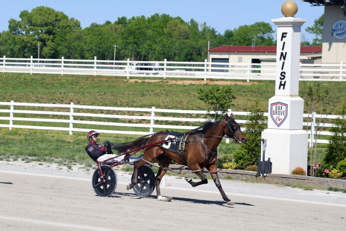 Tip Top Cat with Ronnie Wrenn Jr. winning the $30,000 Open Handicap Pace. (Tony Centonze Photography)